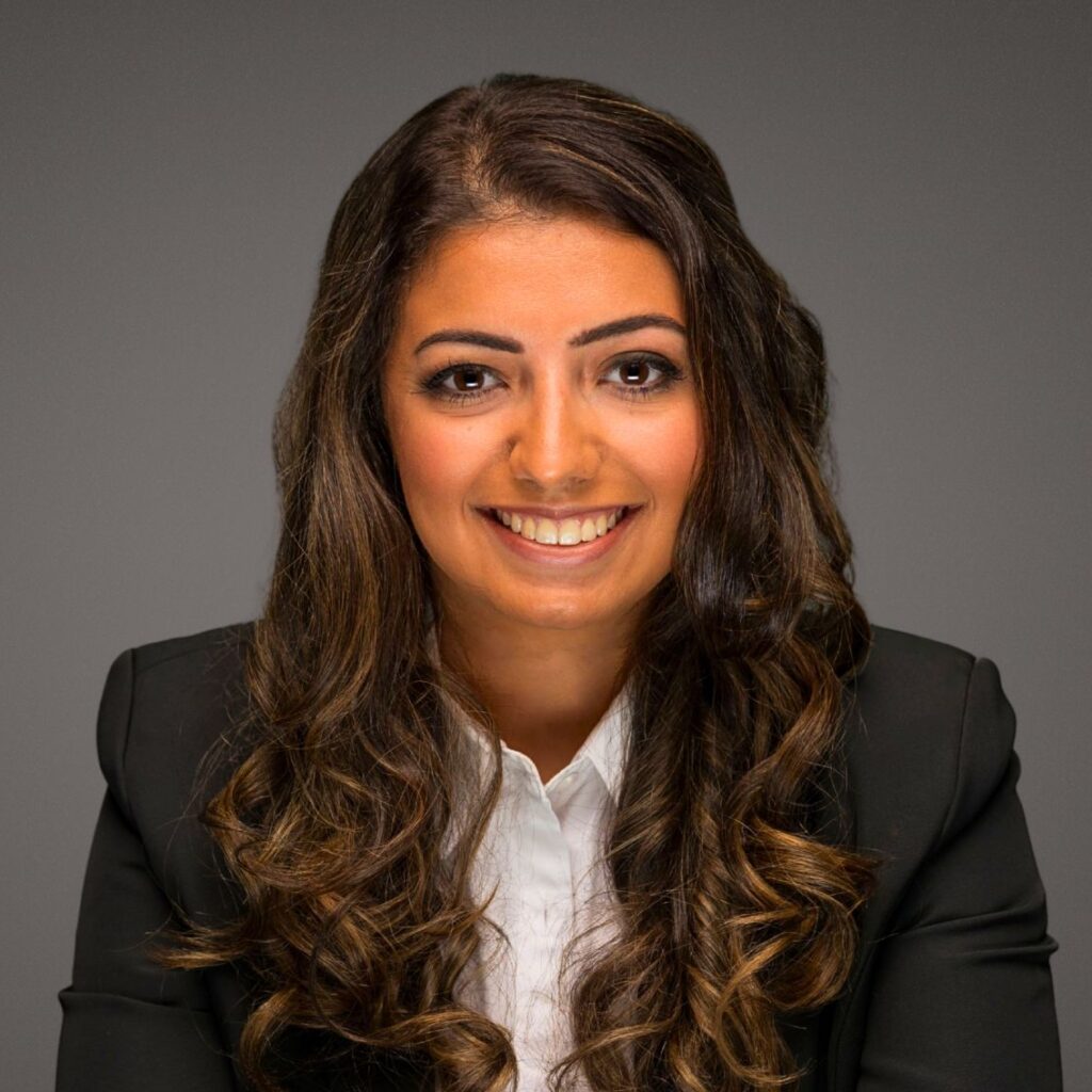 Professional headshot of Rita El Maraghi, a Winnipeg therapist at Oakville Wellness Center specializing in adult mental health support.